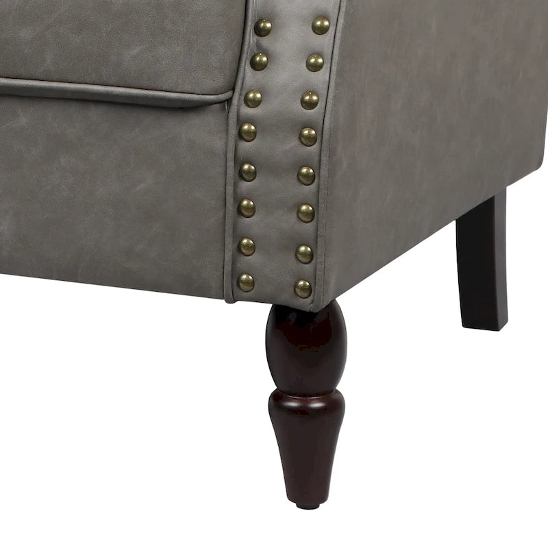 Fauteuil d'appoint en similicuir noir/marron/gris avec accoudoirs roulés, garniture cloutée et pieds en bois – 1 place