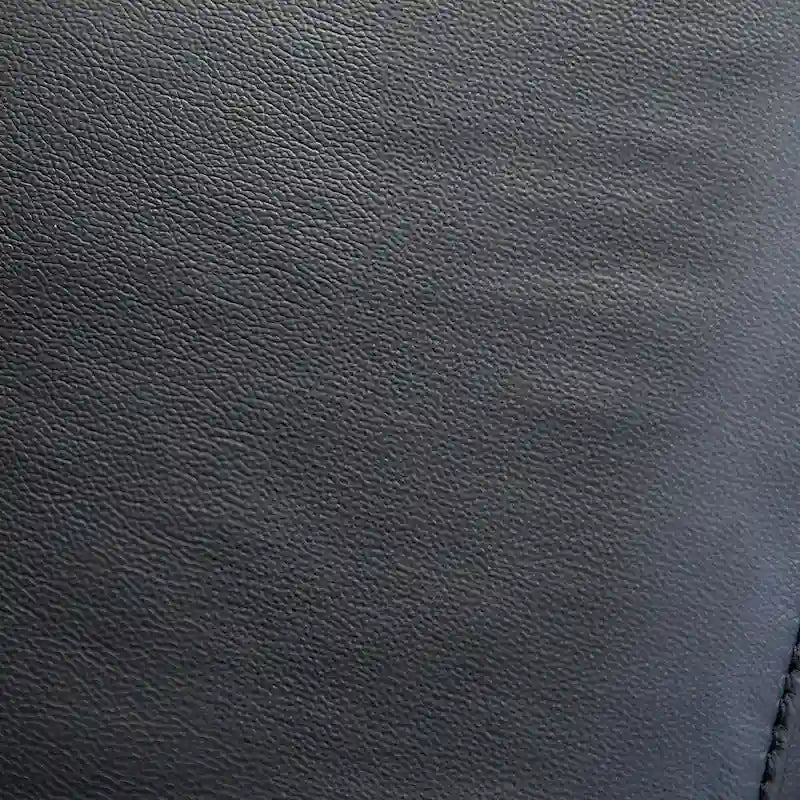 Causeuse inclinable manuelle en cuir assorti noir/taupe avec accoudoirs évasés – 2 places